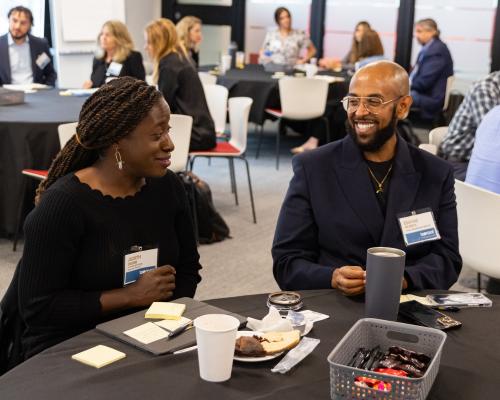 A picture of 2 people at an event.